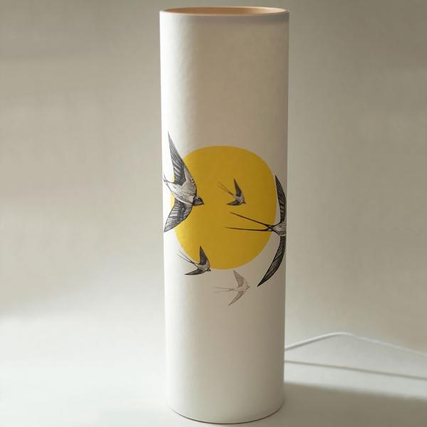A Northern Light Yellow Swallow Lamp