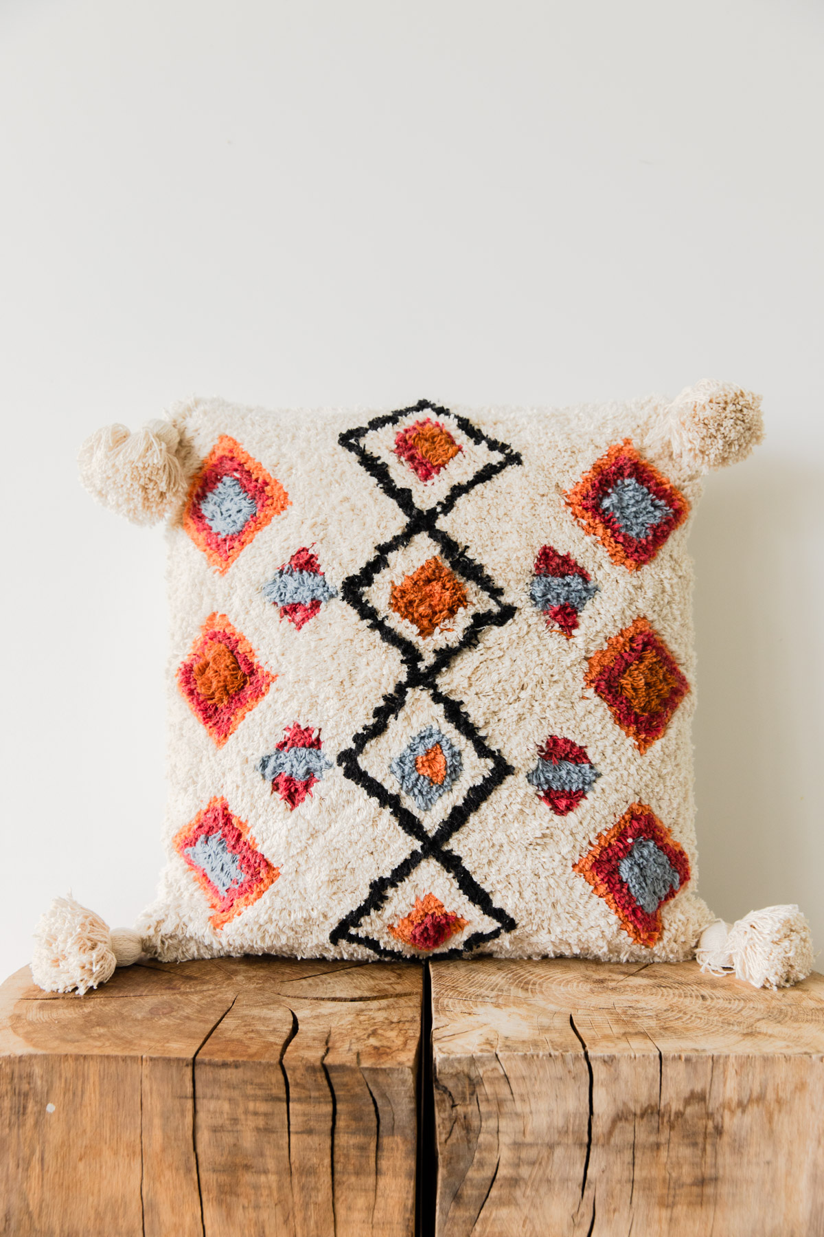 The Painted Bird Patterned Cushion with Tassels