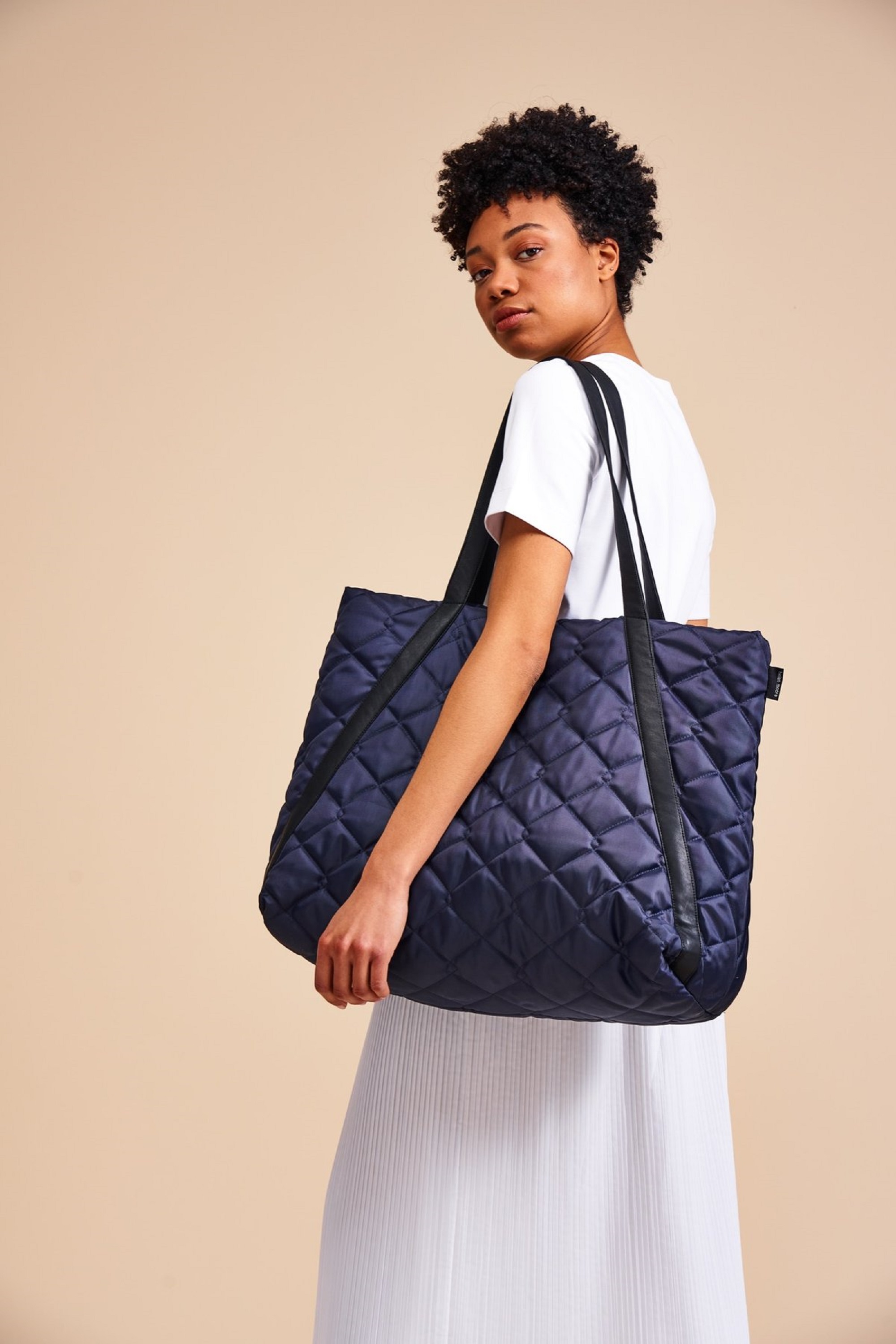 Trouva: Navy Quilted Kit Bag