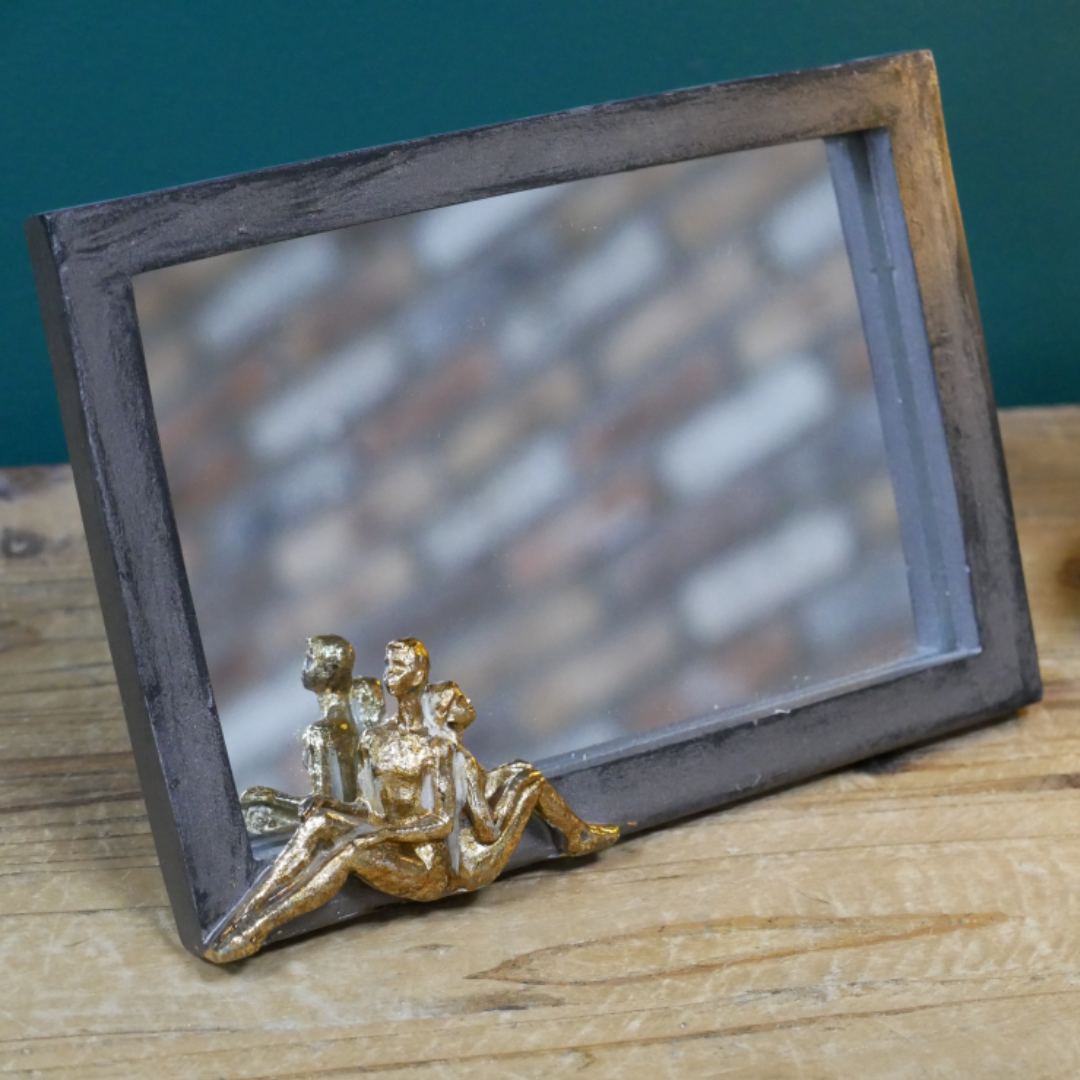 Distressed Mirror With Gold Sitting Figures