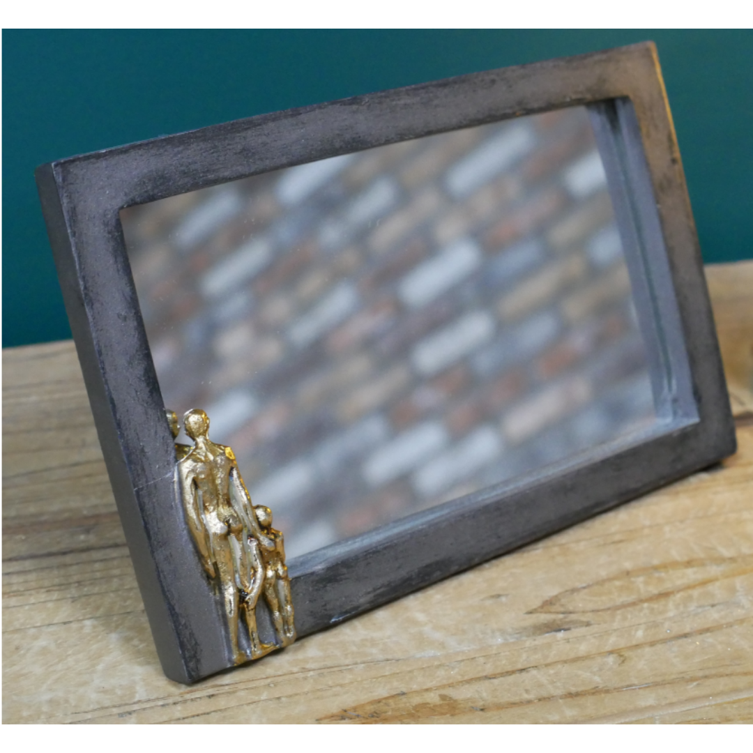 &Quirky Distressed Mirror With Gold Standing Figures