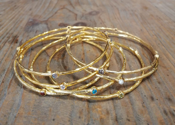 silver-siren-gold-bracelet-with-seed-assorted-stones