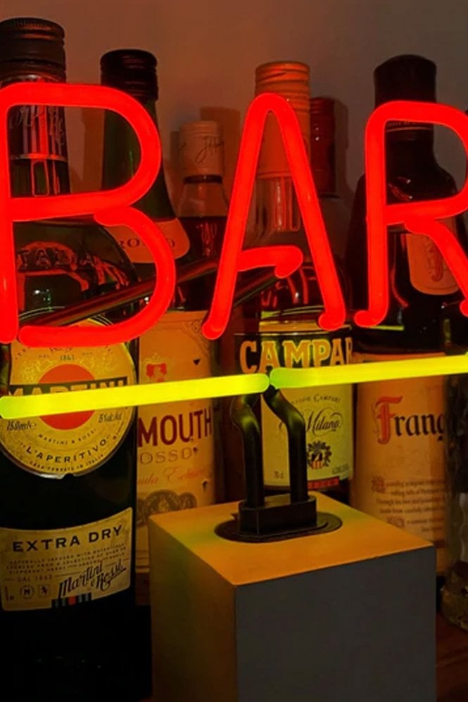 Neon Bar On Concrete Base In Red Lamp