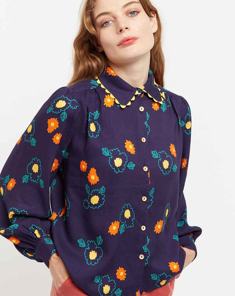 lilac-rose-louche-olena-clarice-floral-print-ric-rac-trimmed-blouse-in-navy