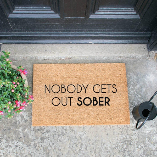 Distinctly Living Nobody Gets Out Sober Doormat