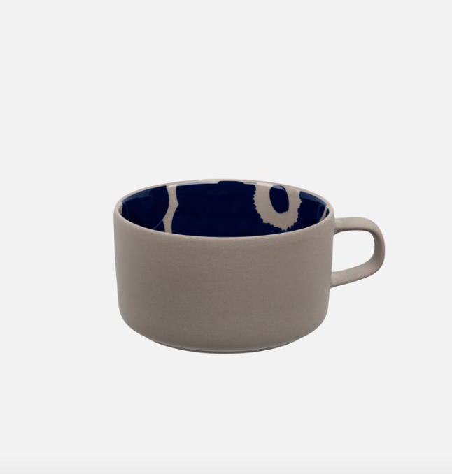 Beige cup with UNIKKO BLUE Design