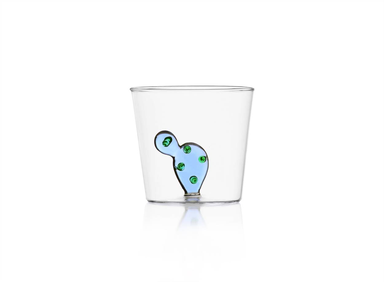 Water glass with colorful blue cactus with green dots