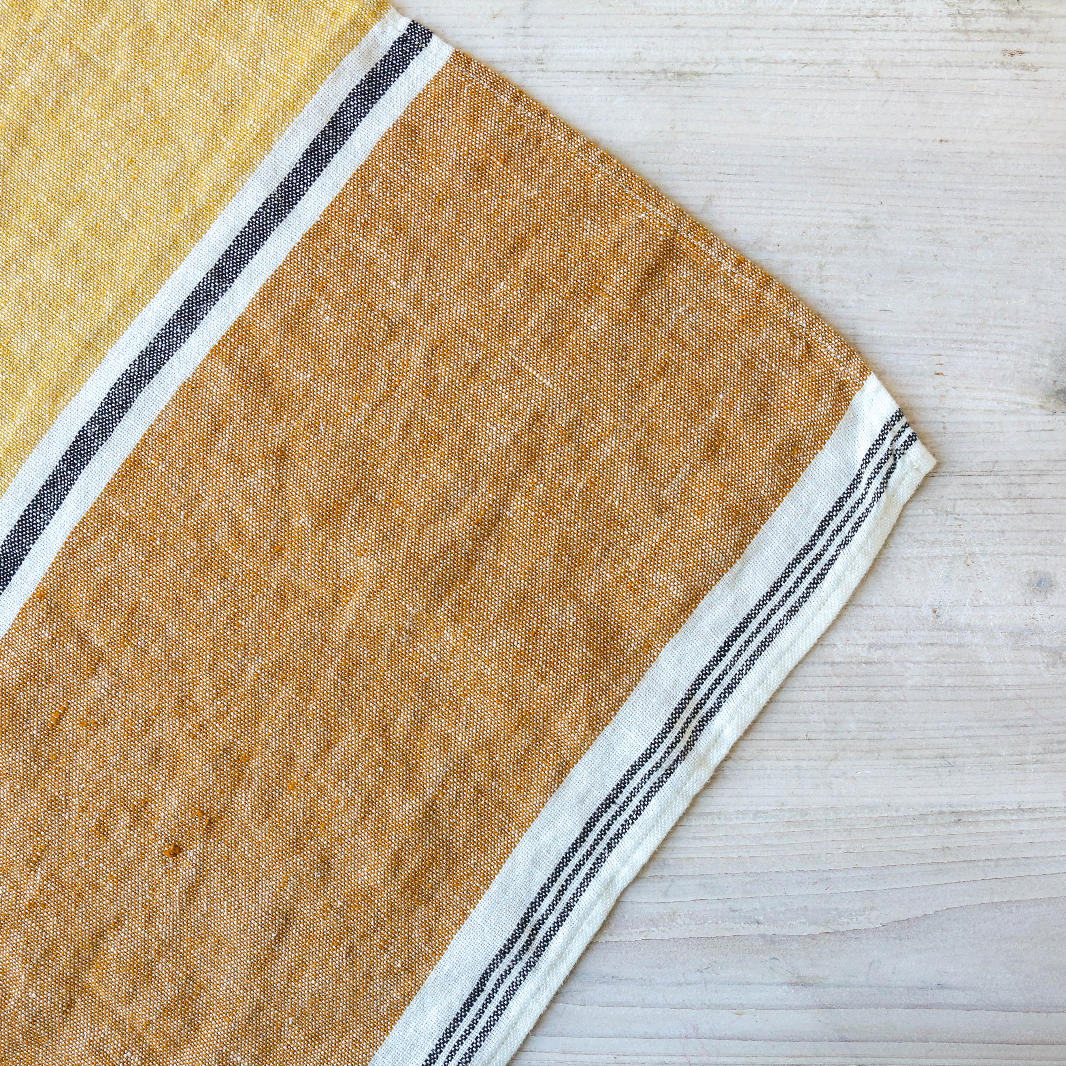 berylune-washed-linen-block-colour-tea-towel-saffron