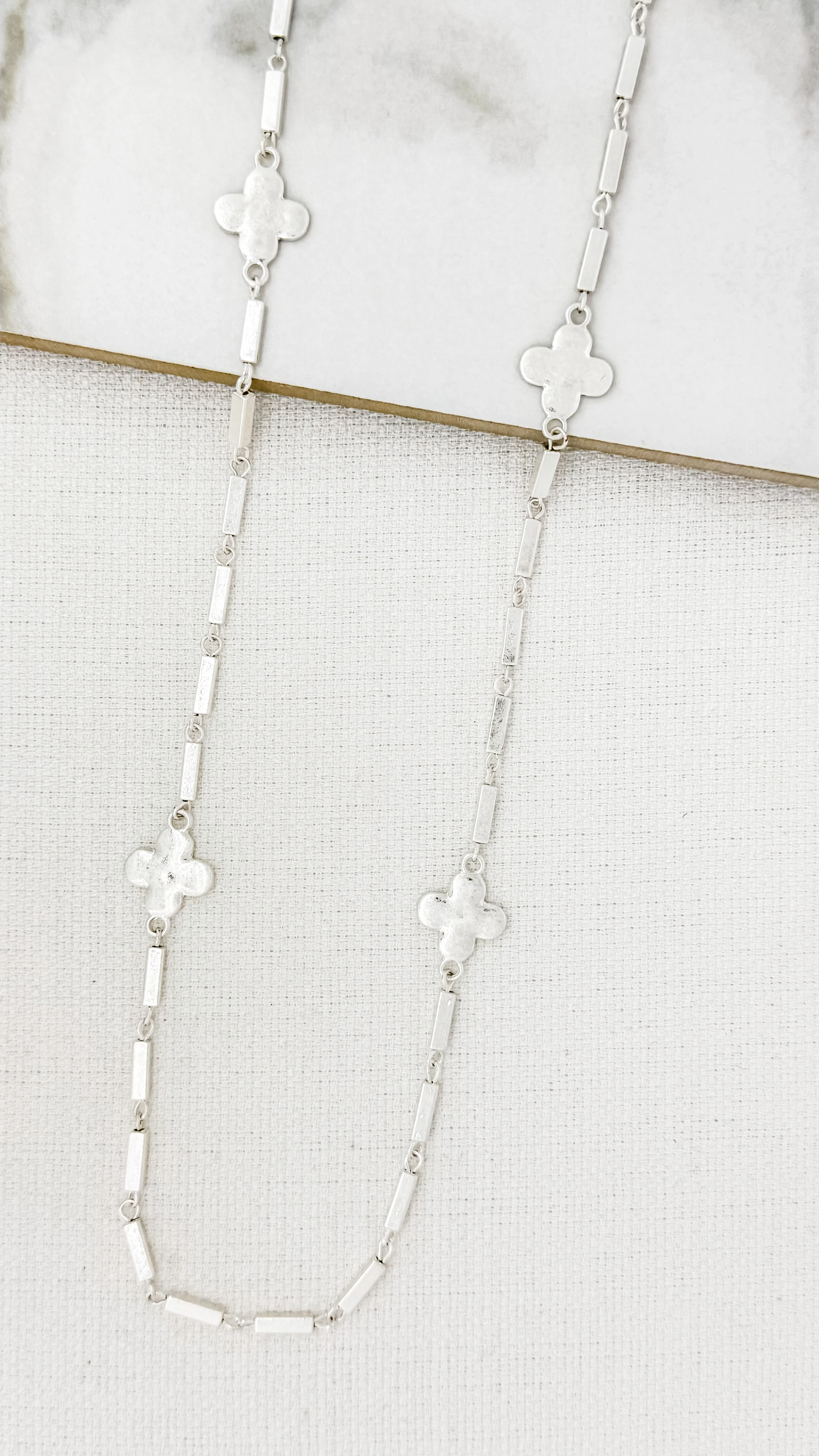 Envy Long Worn Silver Necklace with Silver Fleurs
