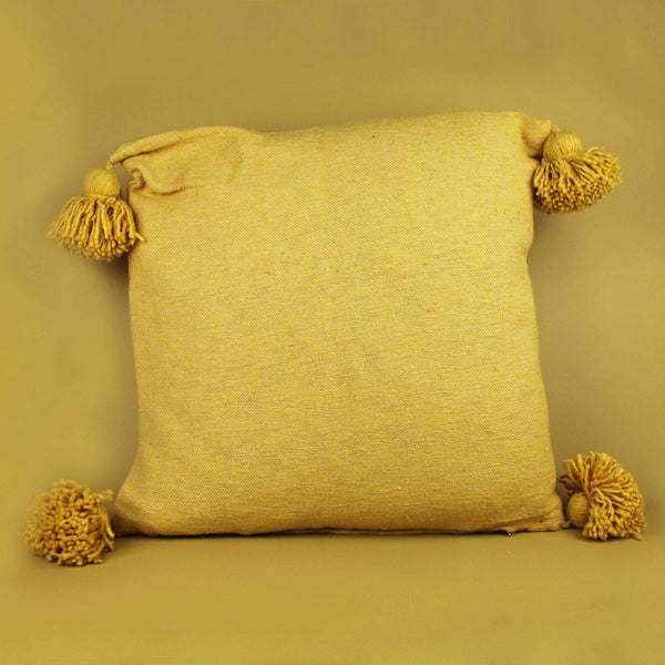 artisan-stories-plain-pom-pom-cushions