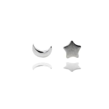 Curiouser And Curiouser Sterling Silver Star And Moon Mismatched Stud Earrings In Metallic