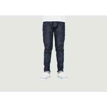 Shop Japan Blue Jeans Circle Selvedge Tapered Raw Jeans In Blue