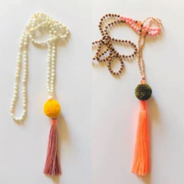 Tribe & Fable Pompom Tassel Necklace In Yellow