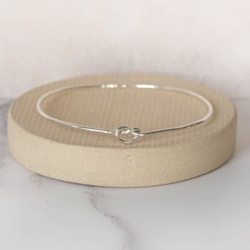 Lucy Kemp Sterling Silver Love Knot Bangle In Metallic