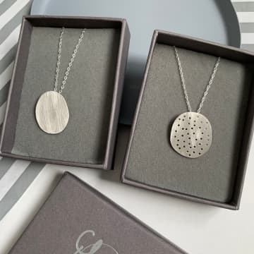 Claire Lowe Jewellery Drilled Silver Pebble Pendant In Metallic