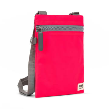 Shop Roka Cross Body Shoulder Swing Pocket Bag Chelsea Recycled Repurposed Sustainable Nylon In Neon Raspberry