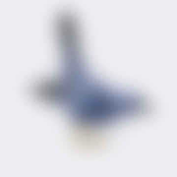 Merme noir en céramique en bleu avec des jambes en laiton et une queue verticale