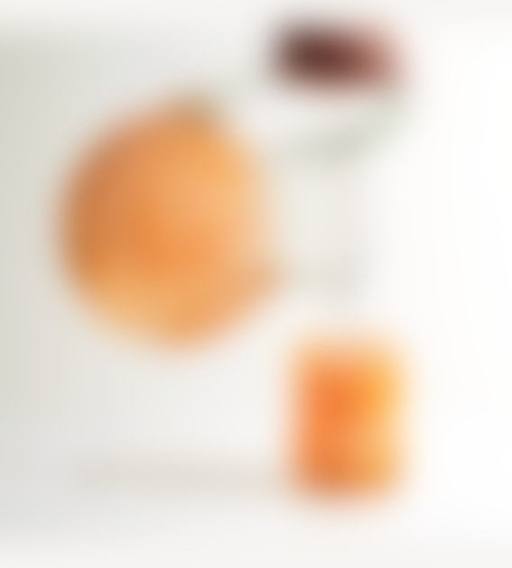 VERVE CULTURE Mexican Handblown Orange Swirl Glass Jug