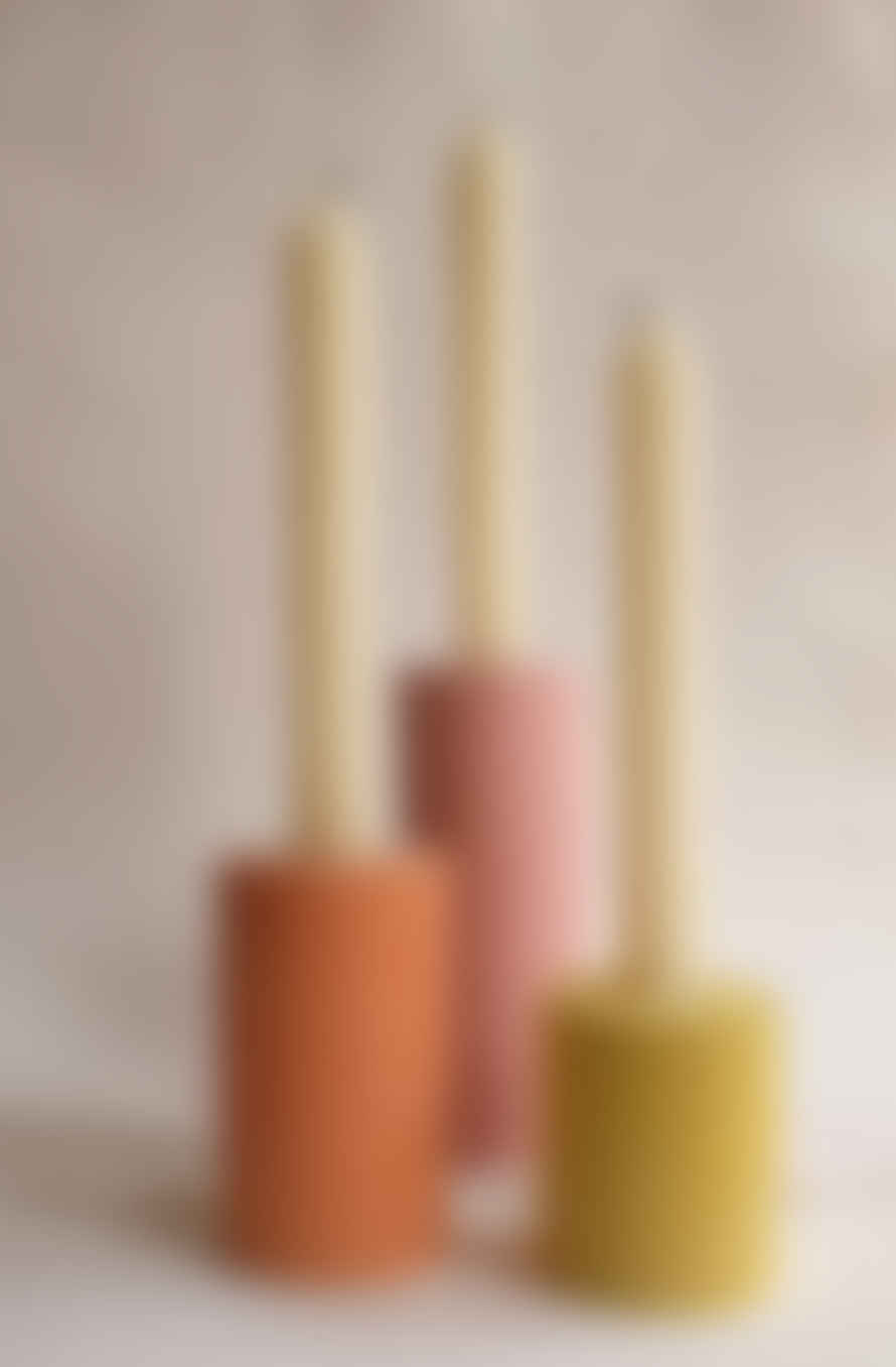 Squid Ink Studio Set of 7 Mixed Pink, Yellow & Rust Column Concrete Candle Stick Holders
