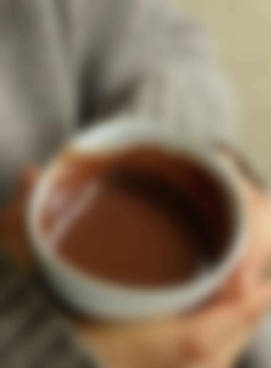 Harth Drinking Hot Chocolate