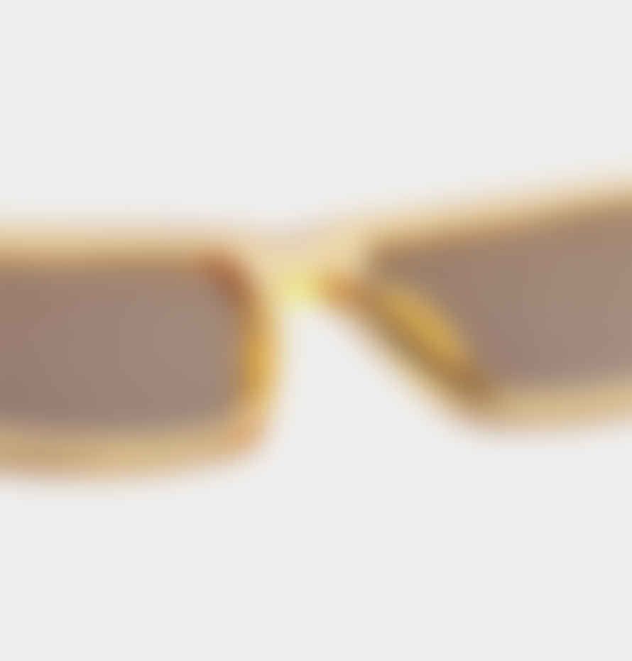 A Kjærbede Fame Sunglasses in Yellow Transparent
