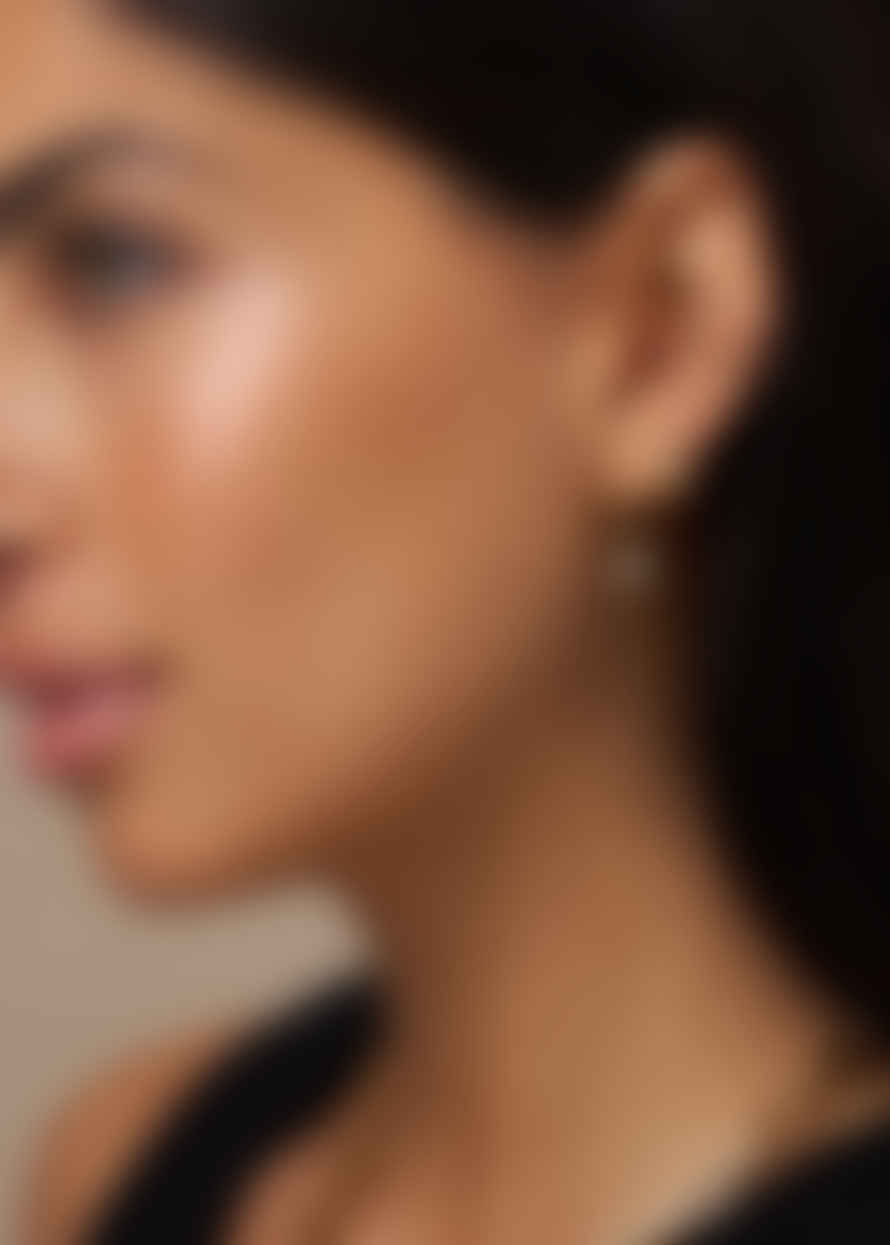 Orelia Tapered Crystal Starburst Huggie Hoop Earrings - Gold