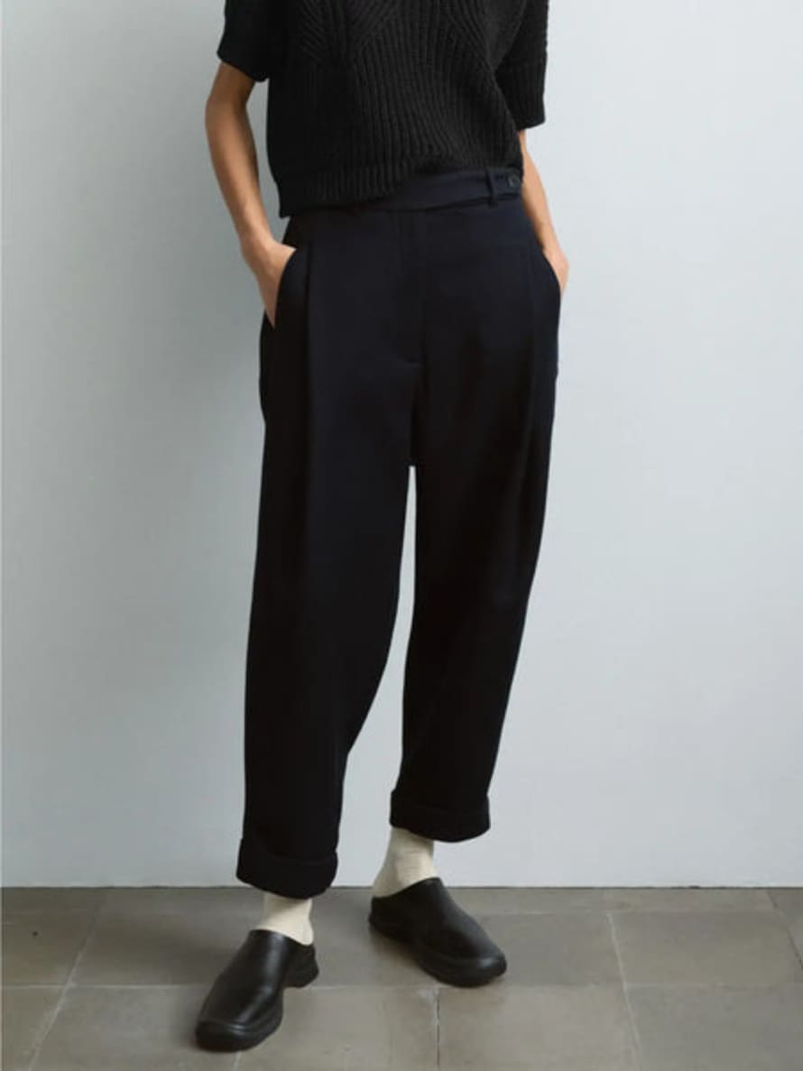 How would you style the carrot pants in elegant charcoal? Top +